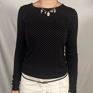 purple and black long sleeve polka dot top